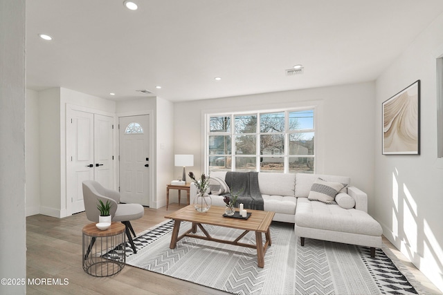 living room with hardwood / wood-style floors