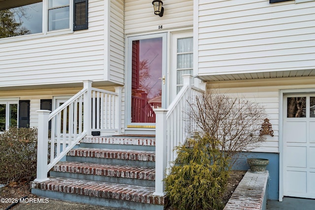 entrance to property featuring a garage