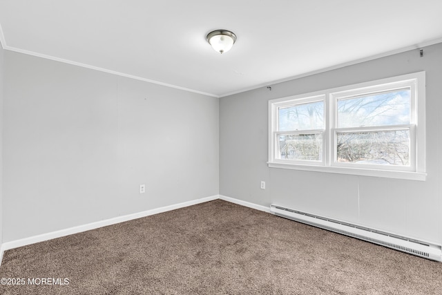 spare room with crown molding, carpet floors, and baseboard heating