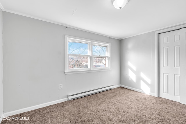 carpeted spare room featuring a baseboard radiator and ornamental molding