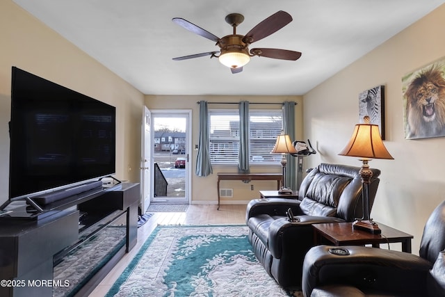 living room with ceiling fan