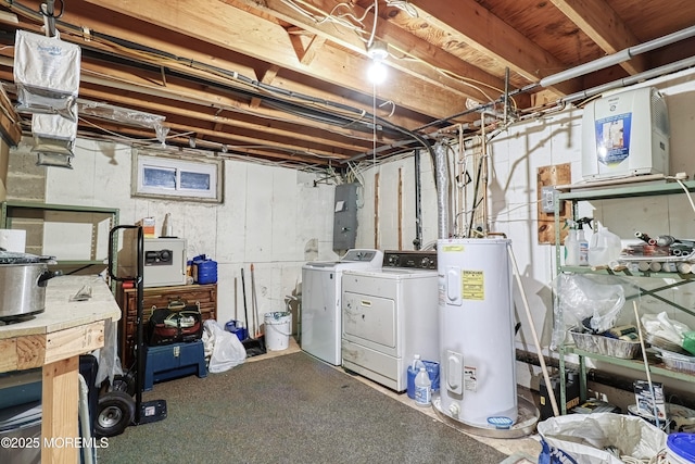 basement with washer and dryer, electric panel, and water heater