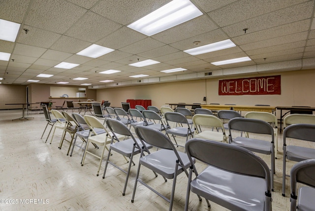 interior space featuring a paneled ceiling