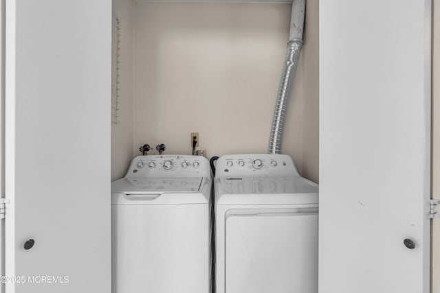 laundry area featuring separate washer and dryer