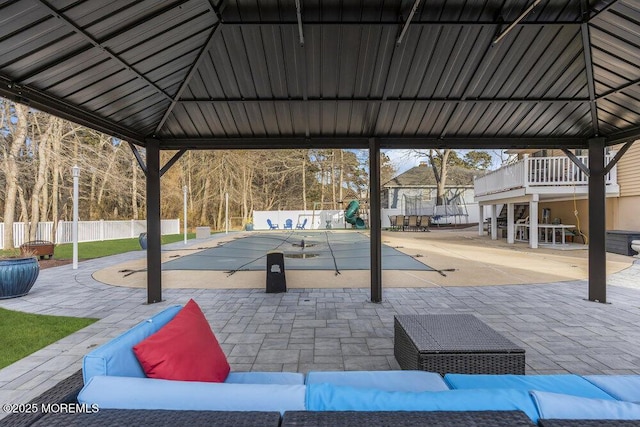 view of home's community with a gazebo, outdoor lounge area, a patio, a playground, and a pool