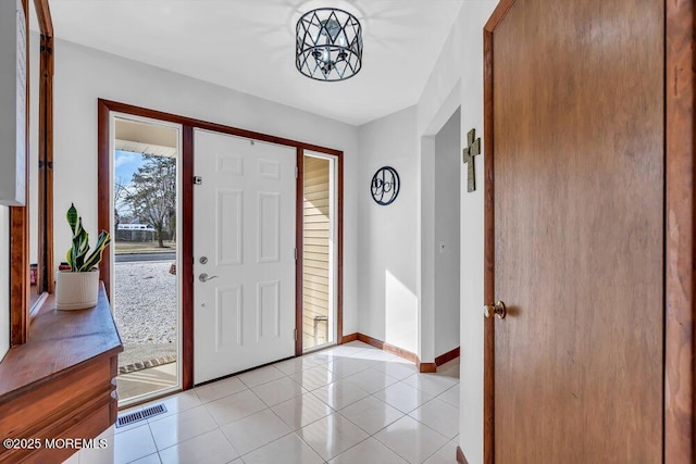 view of tiled foyer entrance