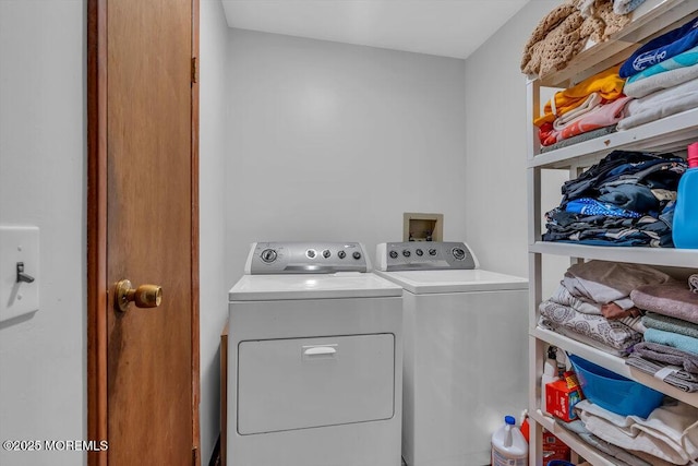 laundry area featuring washing machine and dryer