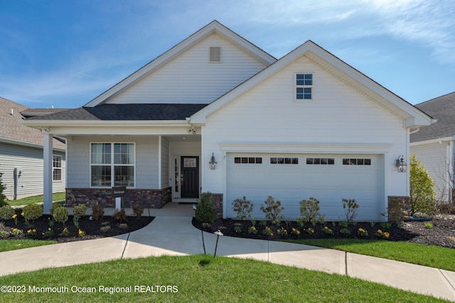 view of front of property with a garage