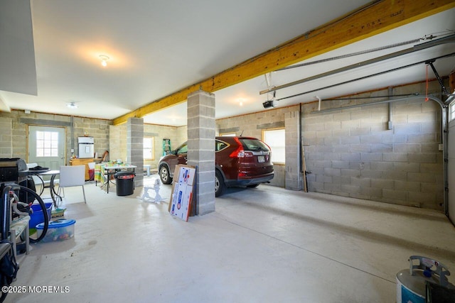 garage featuring a garage door opener