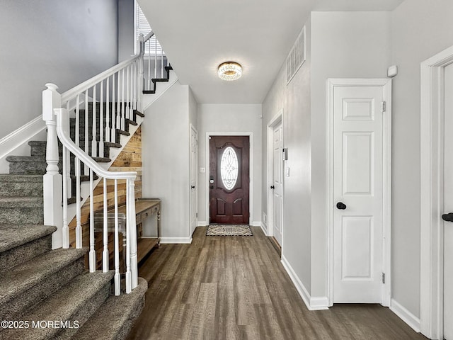 entrance foyer with dark wood-type flooring