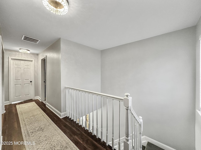 hallway featuring dark hardwood / wood-style floors