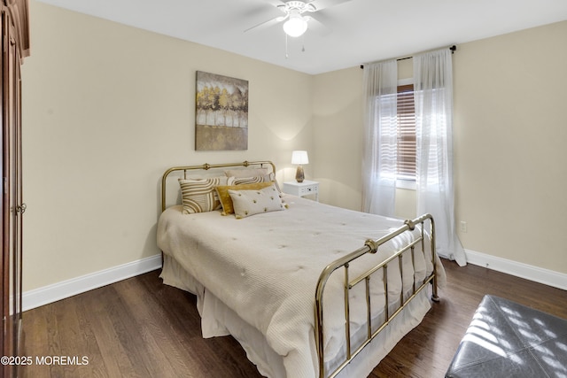 bedroom featuring ceiling fan and dark hardwood / wood-style flooring