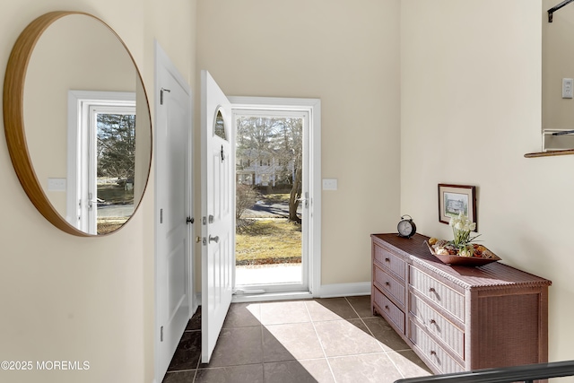 entryway with tile patterned floors