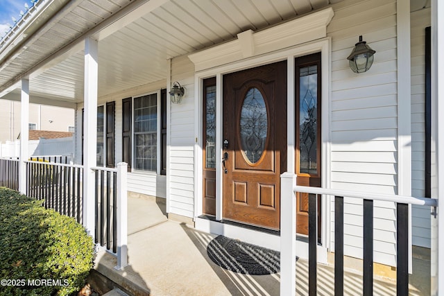 entrance to property with a porch