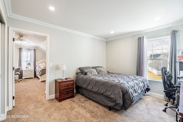 bedroom with ornamental molding and light colored carpet