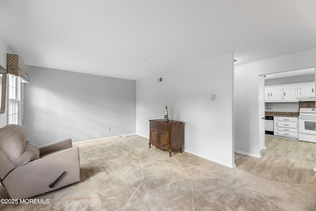 living room featuring light colored carpet