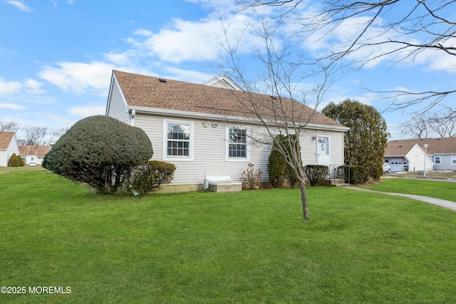 exterior space with a front yard