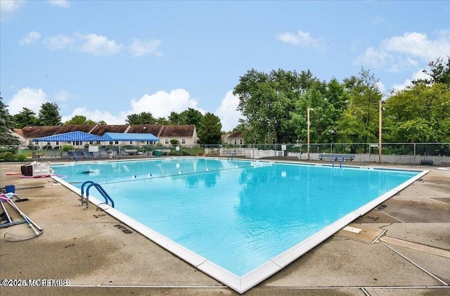 view of pool featuring a patio area