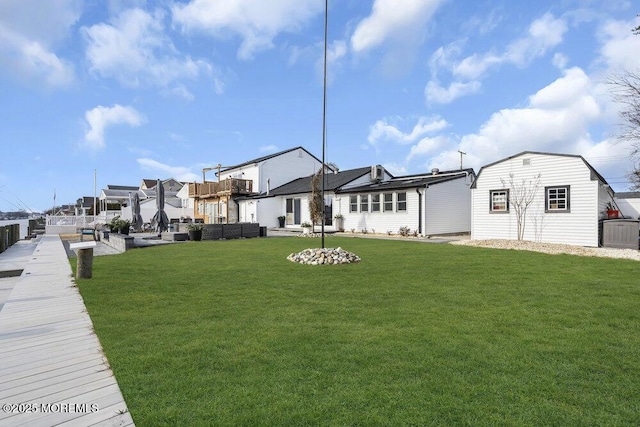 exterior space featuring an outbuilding and a yard