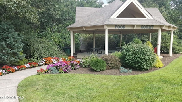 surrounding community featuring a gazebo and a yard