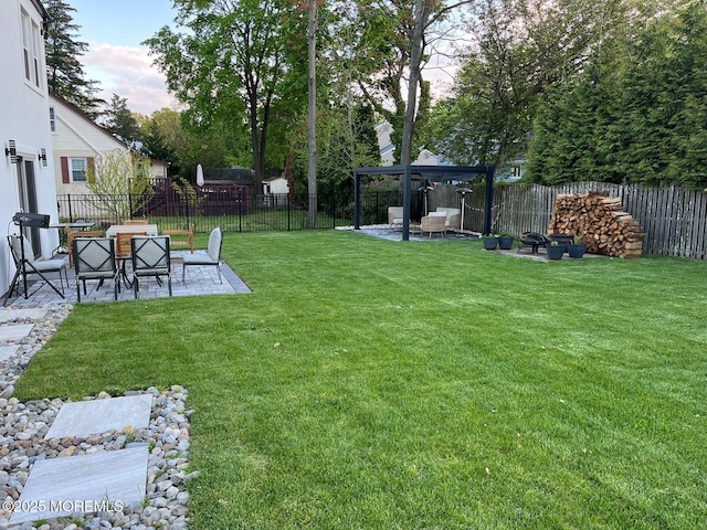 view of yard featuring a gazebo and a patio area