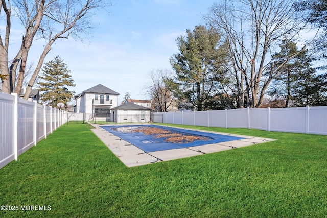 view of swimming pool with a patio and a lawn