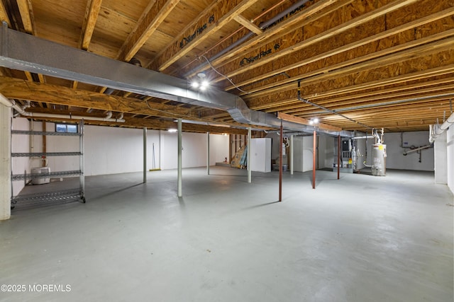 basement featuring gas water heater