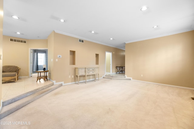 carpeted living room with ornamental molding