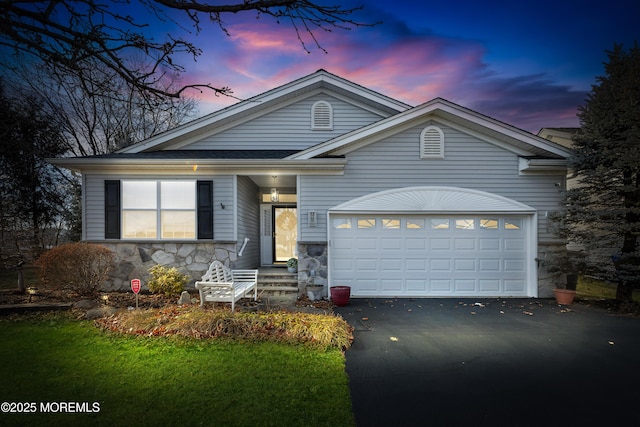 view of front of property with a garage