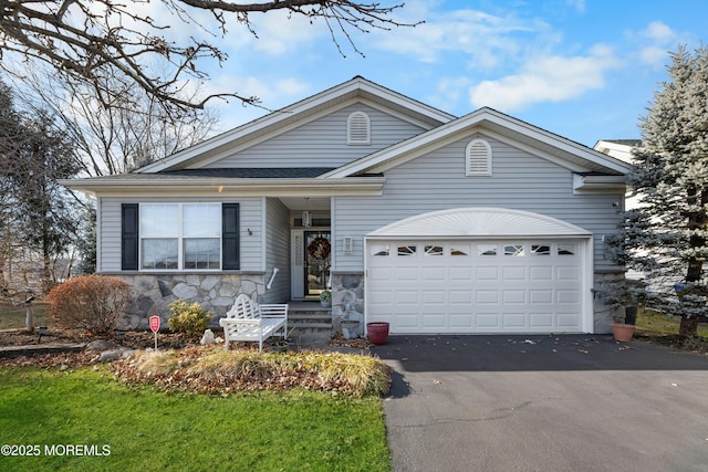 ranch-style house featuring a garage