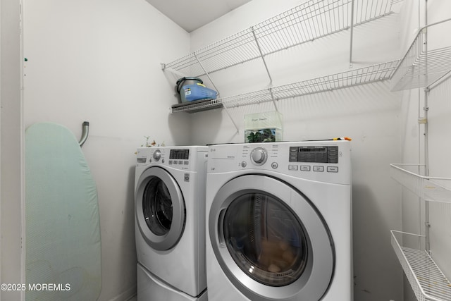 laundry area featuring washing machine and dryer