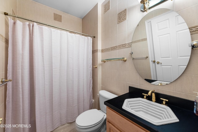 bathroom with curtained shower, tile walls, decorative backsplash, vanity, and toilet