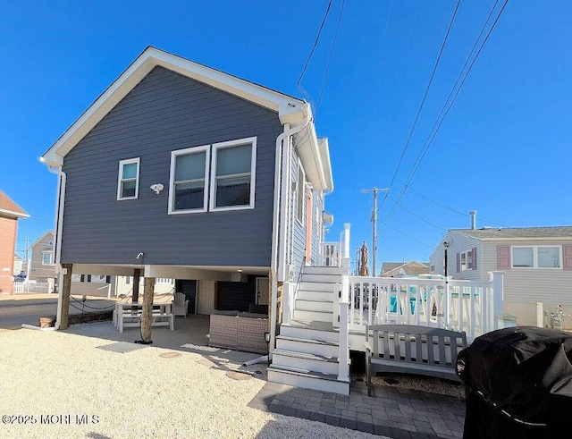 rear view of property with a patio