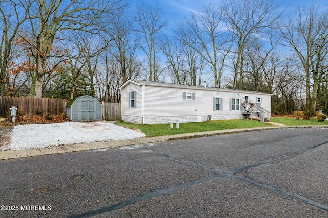 manufactured / mobile home featuring a storage unit