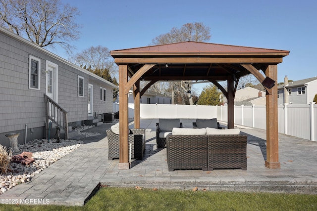 view of patio featuring a gazebo and outdoor lounge area