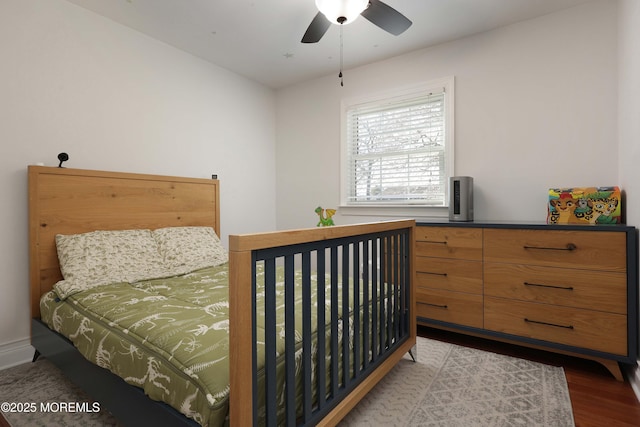 bedroom featuring ceiling fan and light hardwood / wood-style floors