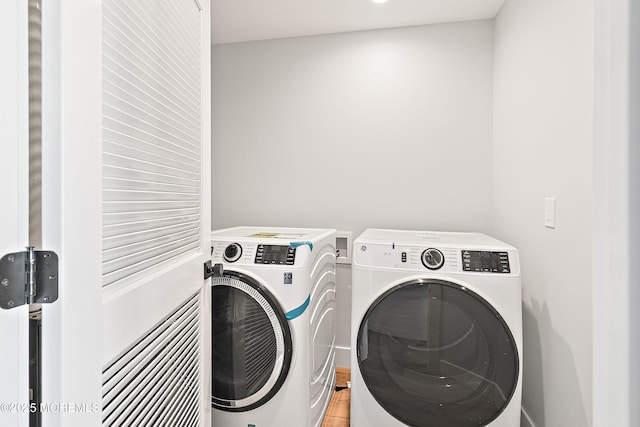324 3rd St, Beach Haven, NJ 08008 - laundry area featuring washing machine and dryer and light wood finished floors