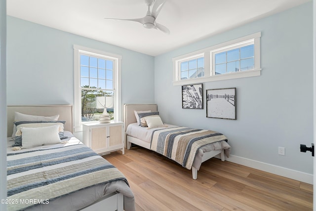 324 3rd St, Beach Haven, NJ 08008 - bedroom featuring light wood finished floors, a ceiling fan, and baseboards