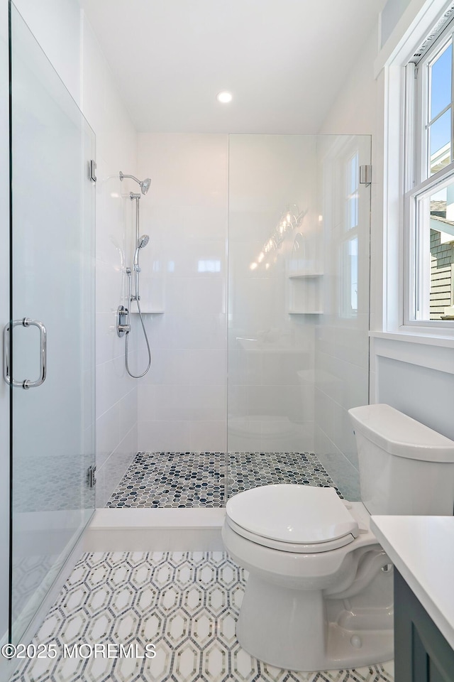 324 3rd St, Beach Haven, NJ 08008 - bathroom with toilet, a stall shower, vanity, and recessed lighting