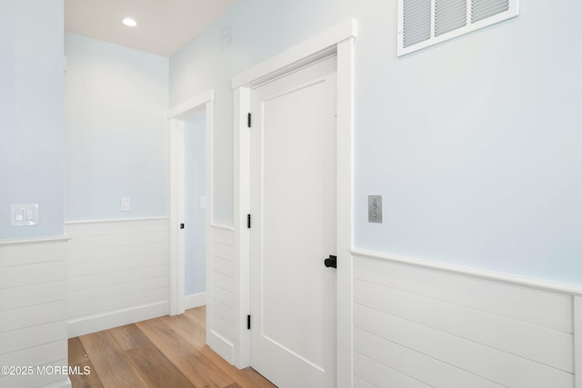 324 3rd St, Beach Haven, NJ 08008 - hallway featuring wood finished floors, a wainscoted wall, wooden walls, and recessed lighting