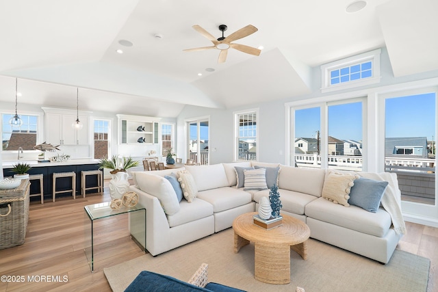 324 3rd St, Beach Haven, NJ 08008 - living room with light wood-type flooring, a ceiling fan, and lofted ceiling