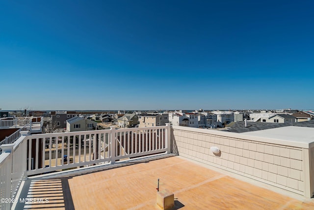 324 3rd St, Beach Haven, NJ 08008 - view of patio featuring a residential view and a balcony