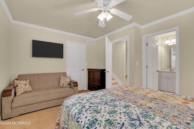 carpeted bedroom featuring crown molding and ceiling fan