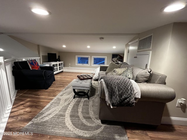 living room with dark hardwood / wood-style flooring