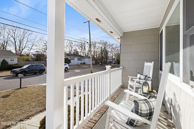 balcony featuring covered porch