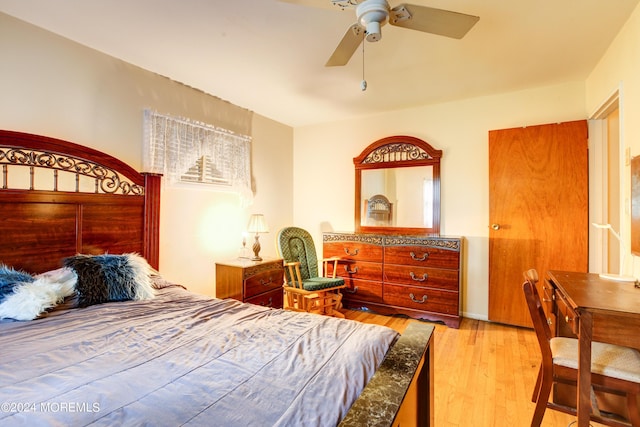 bedroom featuring ceiling fan and light wood-type flooring