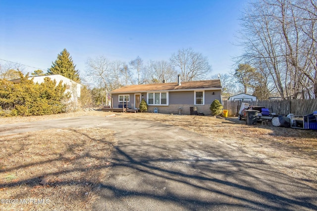 ranch-style house with a deck