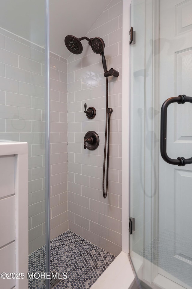 bathroom featuring an enclosed shower