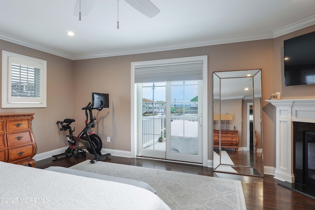 bedroom with access to outside, ornamental molding, dark hardwood / wood-style floors, and ceiling fan