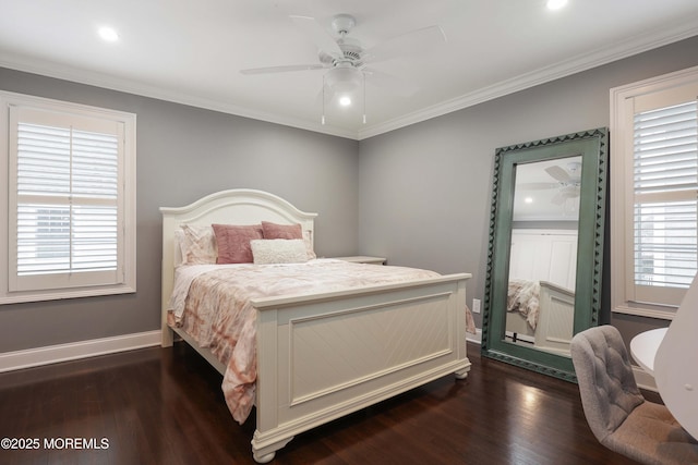 bedroom featuring ornamental molding, dark hardwood / wood-style floors, and ceiling fan